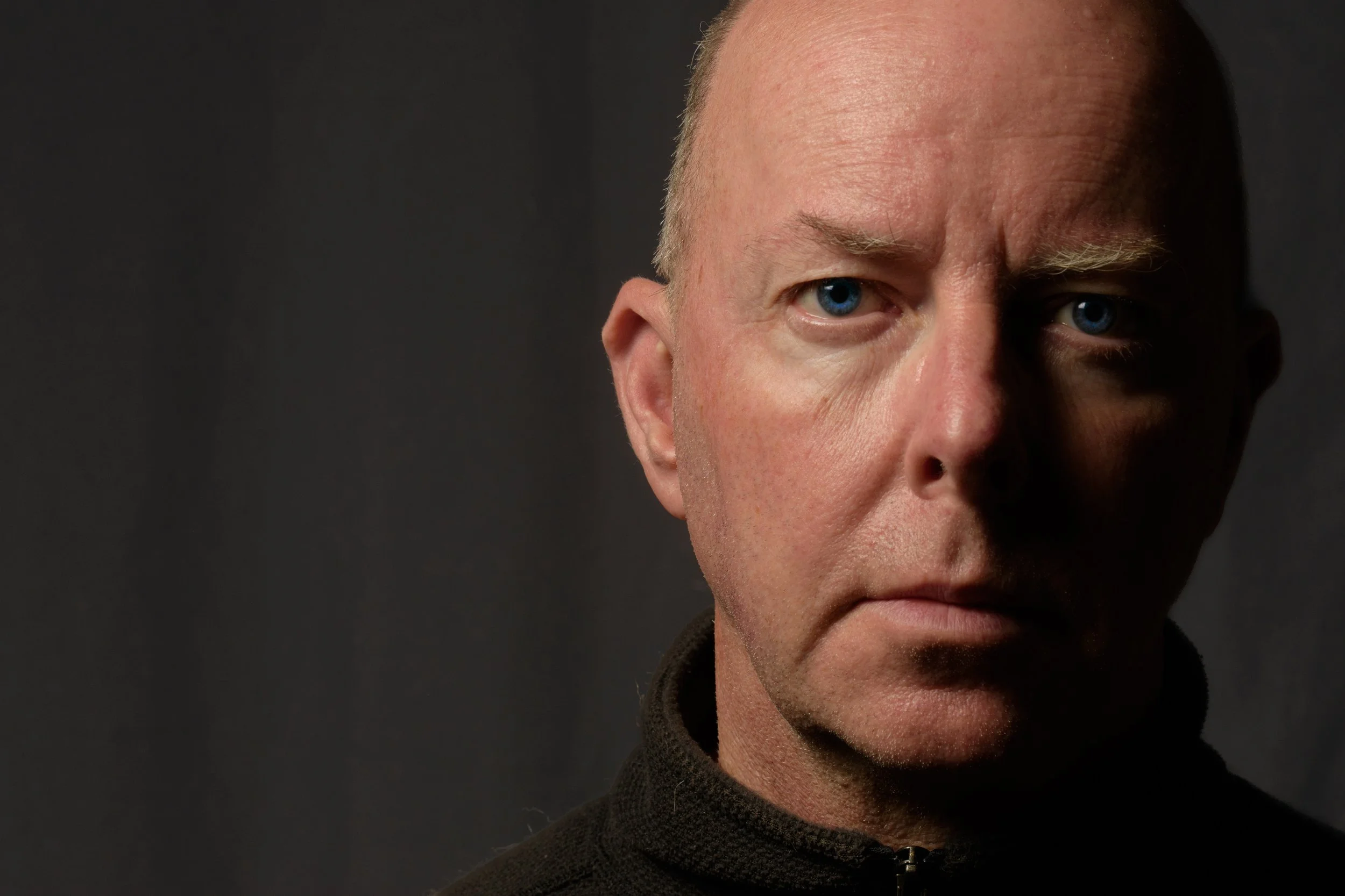 Self portrait photograph of Robert Betteley used on the contact page of his official website, Robert Betteley Photography.