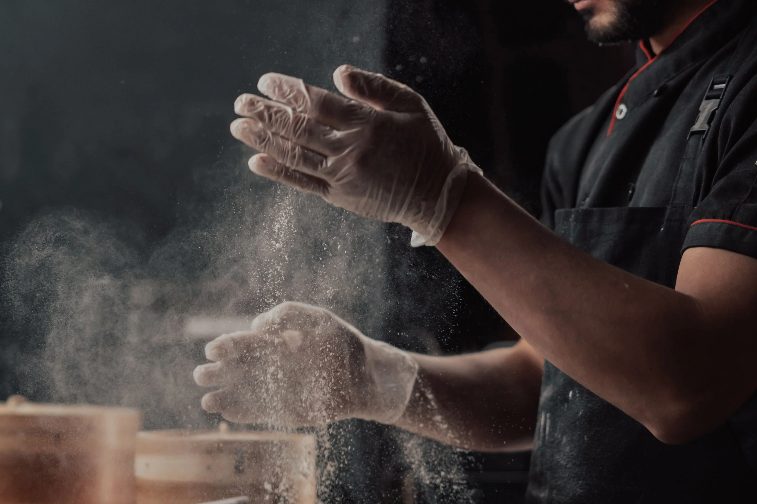 Chef preparing food in a commercial cloud kitchen