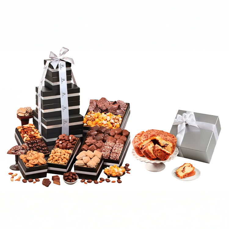 Assorted chocolates, cookies, and a slice of cake with a gift box on a white background.