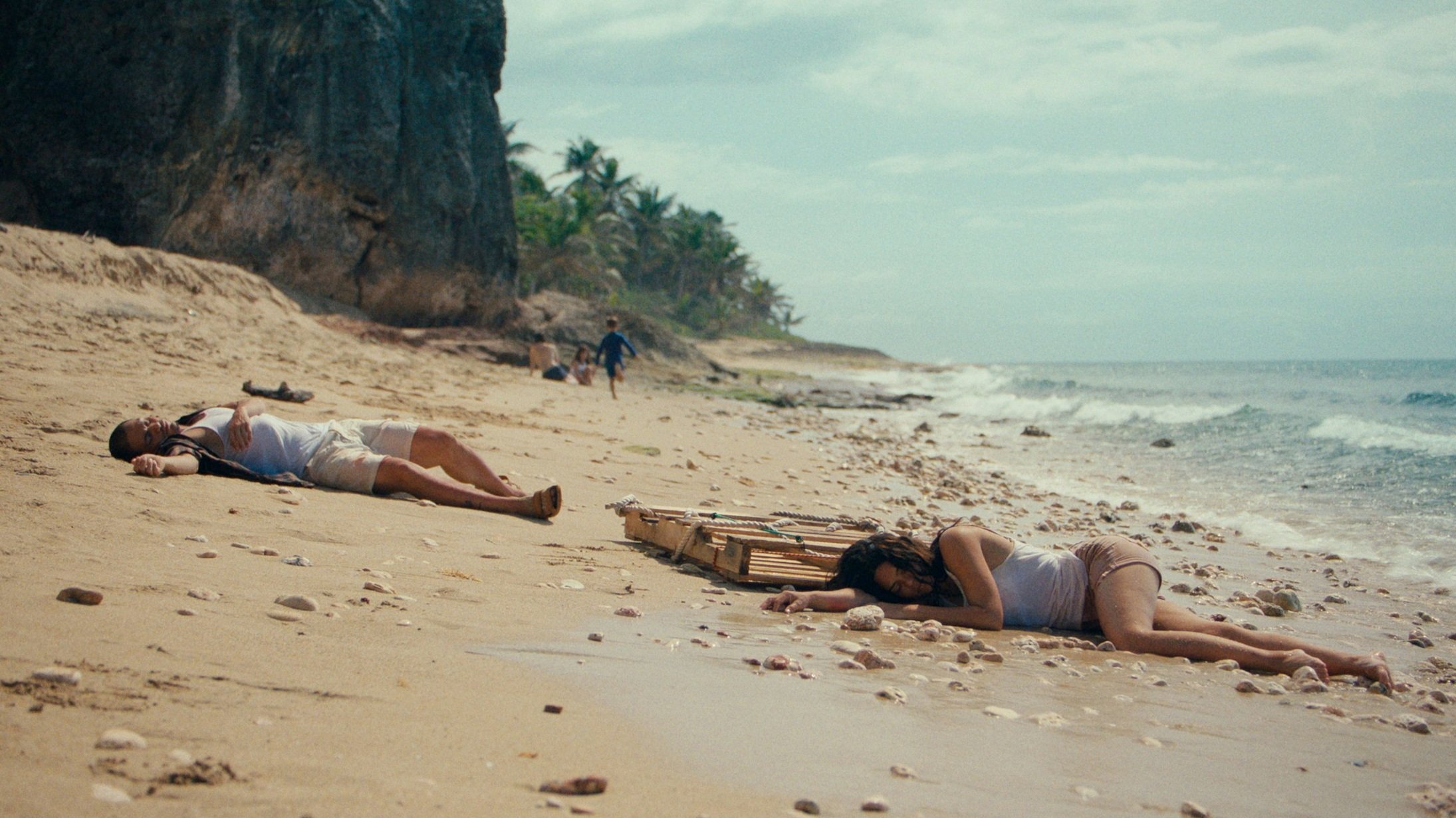 RAUL+AND+TALISA+PASSED+OUT+ON+BEACH.jpg