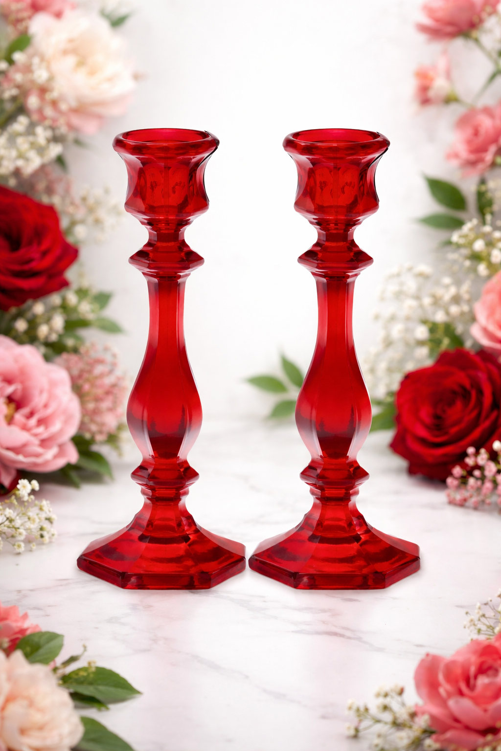 Elegant red crystal candlesticks with flowers.png