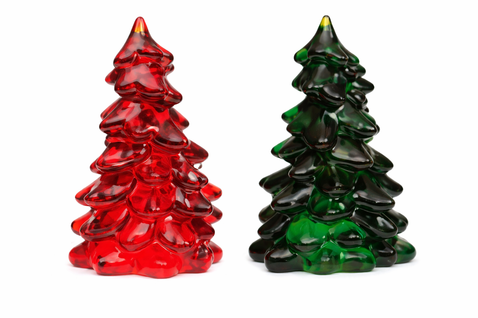 Red and green glass Christmas trees.png