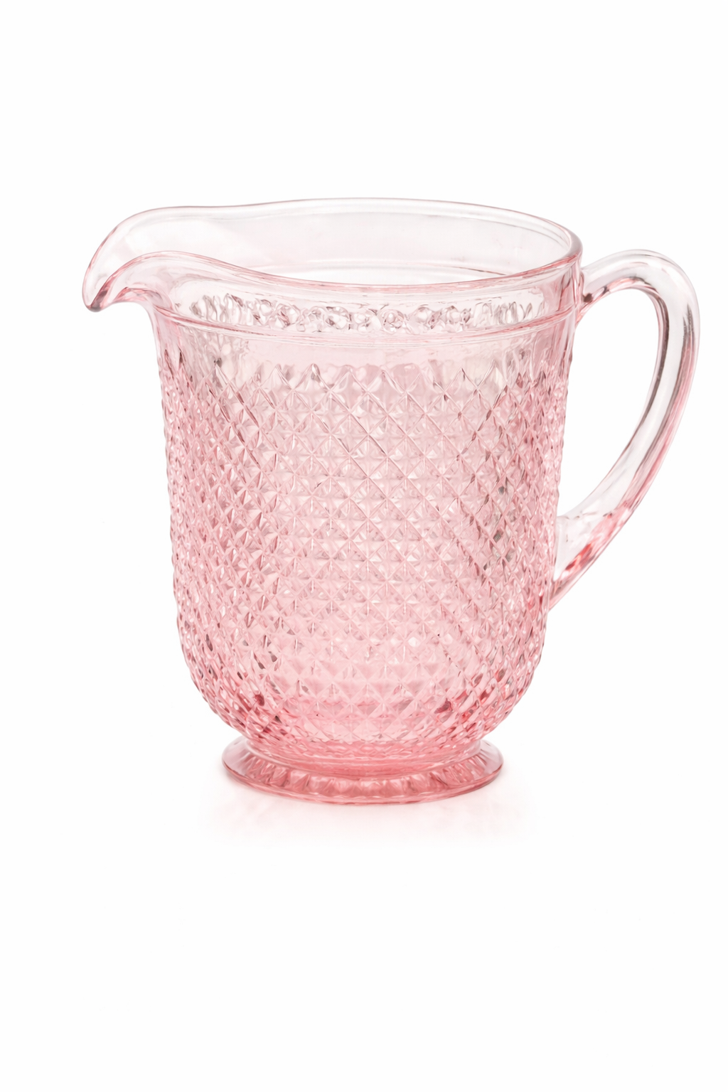 Vintage pink glass pitcher on white.png