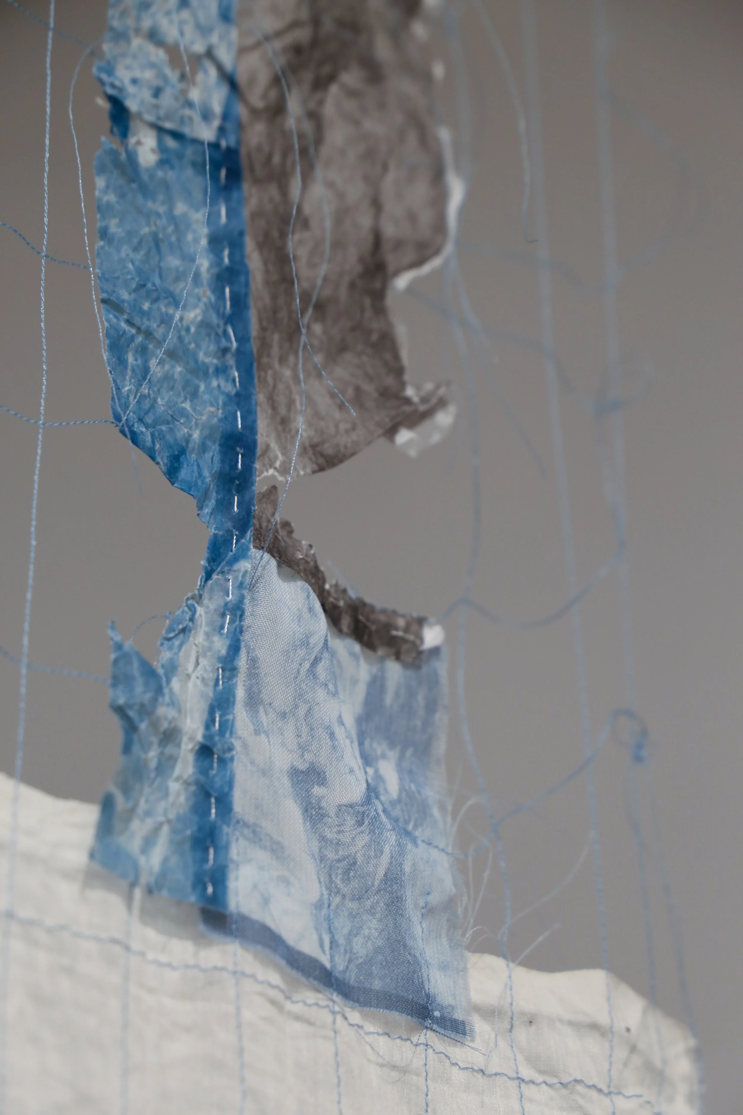 If god was a father, fathers would be more like breath, 2026, text, thread, cyanotype on paper