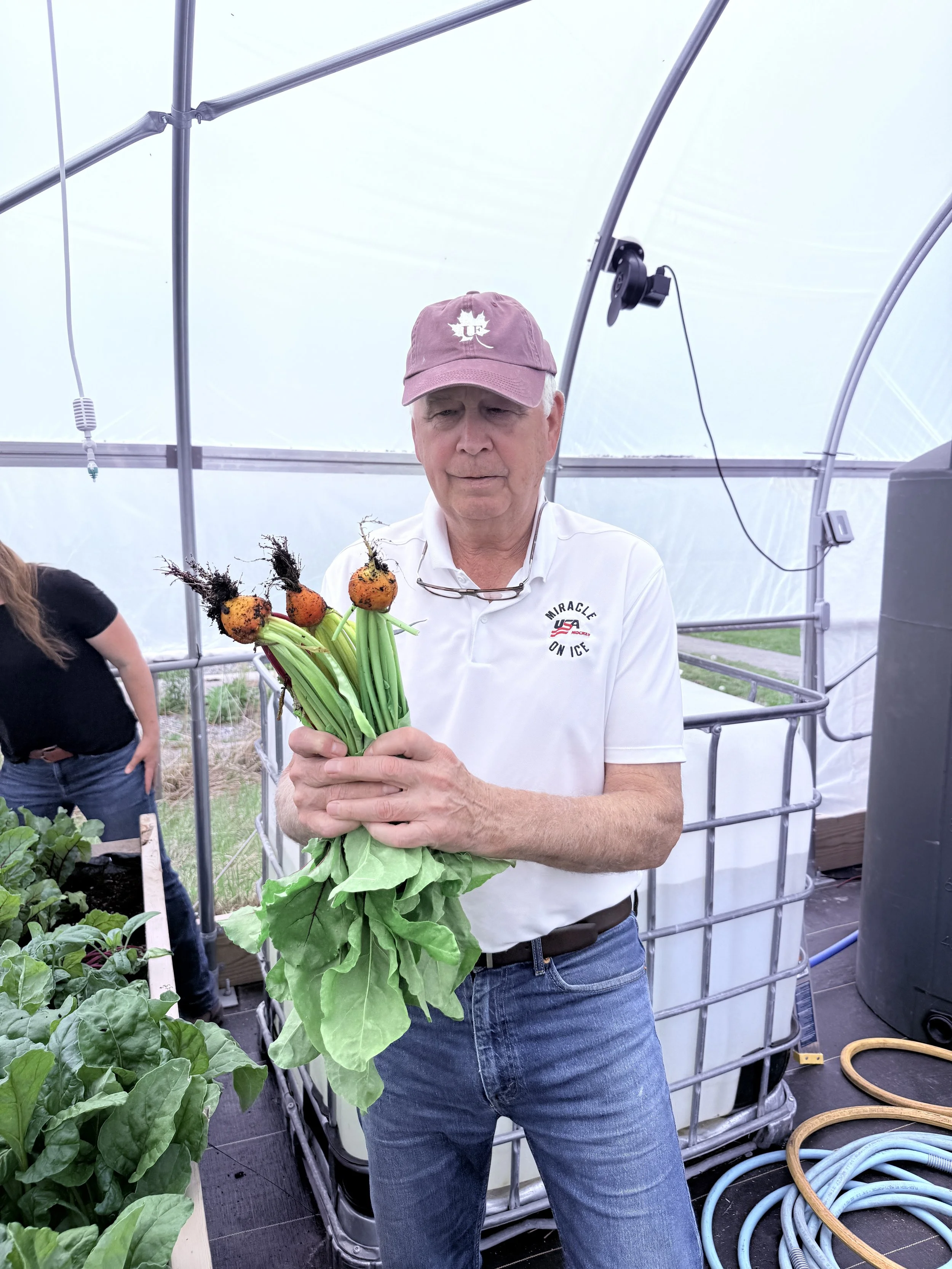 Roby with Radishes.JPG