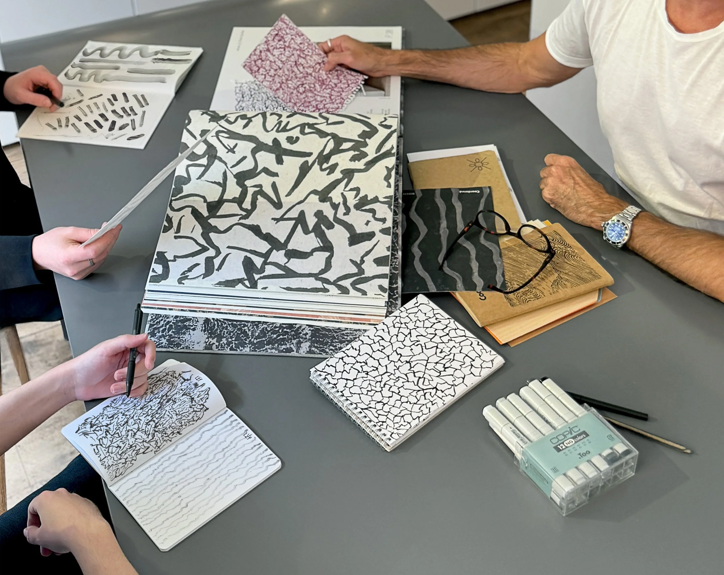 bodo sperlein working with his team in london studio