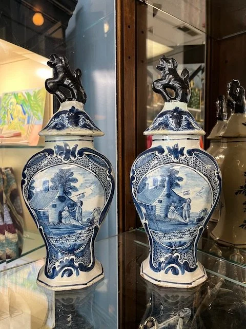 Pair of beautiful early Delft covered vases.  Dogs of Fu finials.  Dated about 1761.