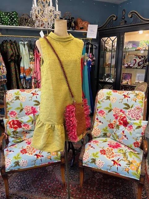 Vintage style dress with fun straw purse