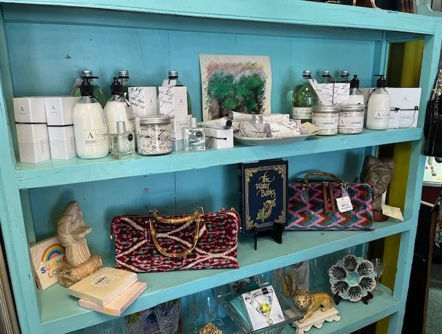 Assortment of ARCHIVE Essentials body lotions, body scrubs, hand lotions, bubble bath and fragrances