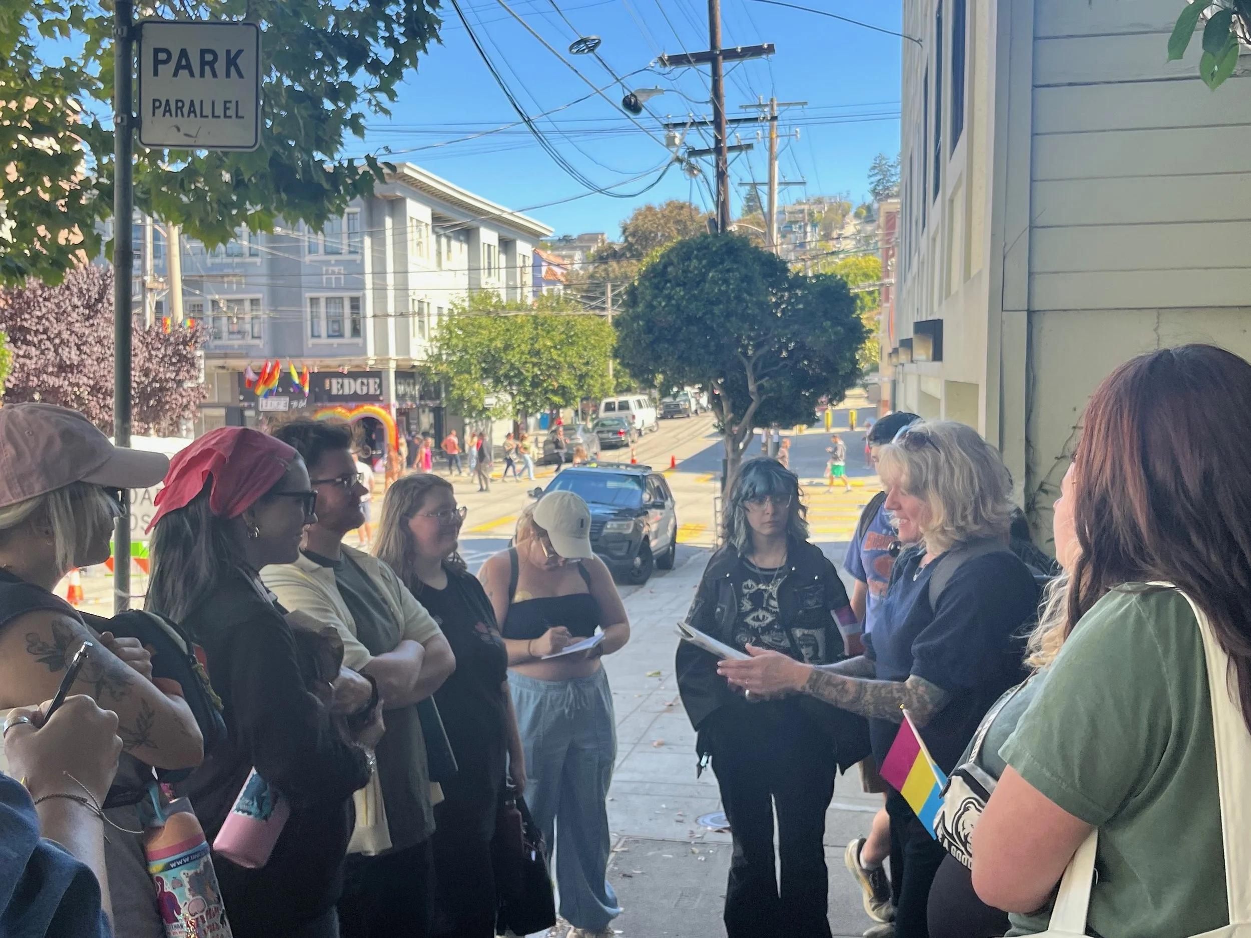 UNC26_ Prof Cook w_ students in The Castro.jpeg
