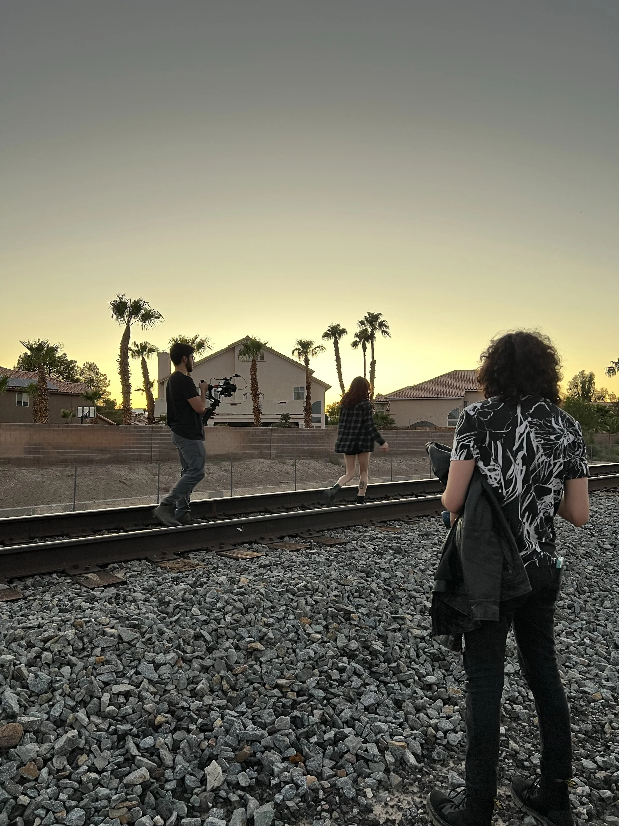 BTS on Las Vegas railroad tracks during music video production of "See Ya Later"