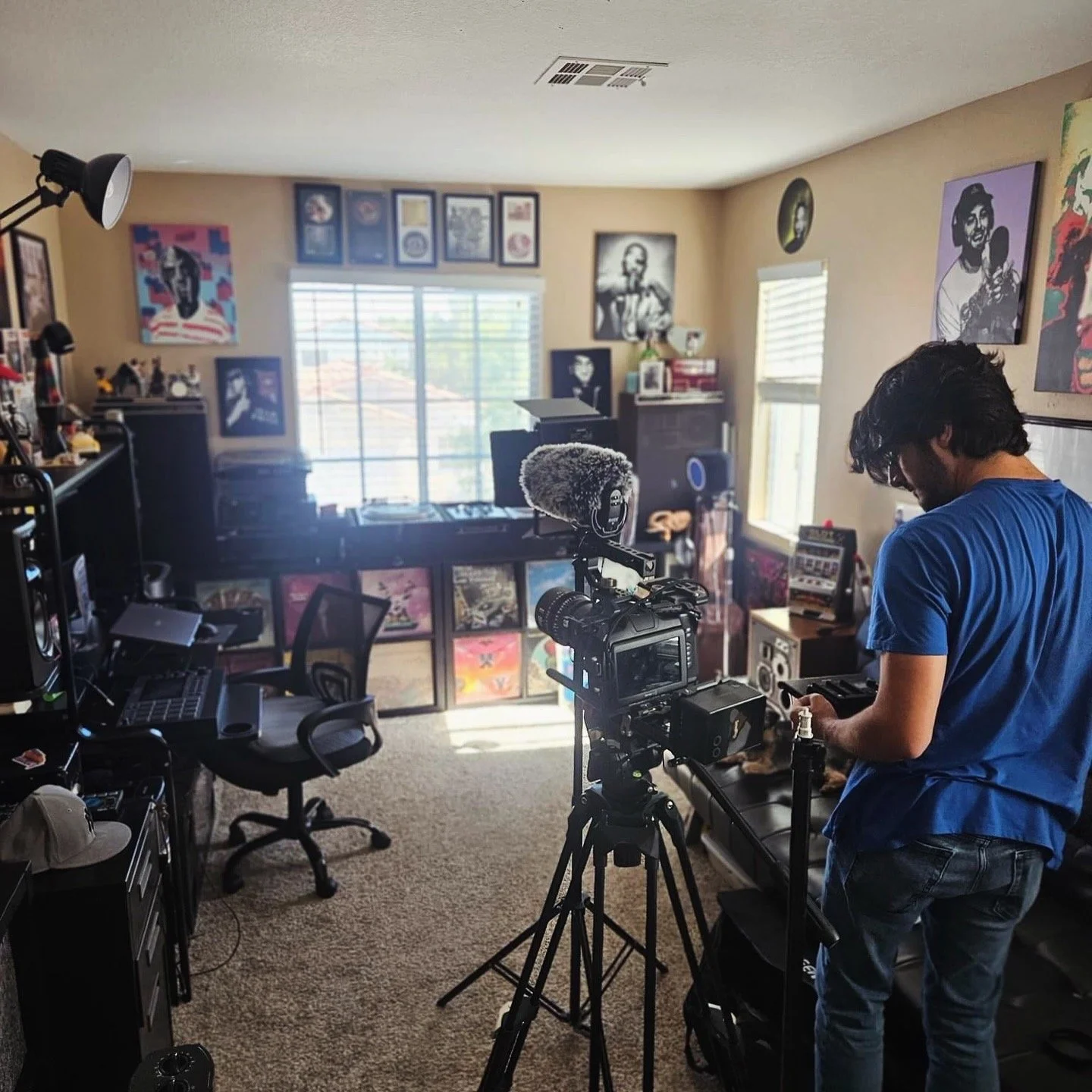Behind the scenes, director Kyle Cooper sets camera for filming of narrative production / documentary "Endangered Language"