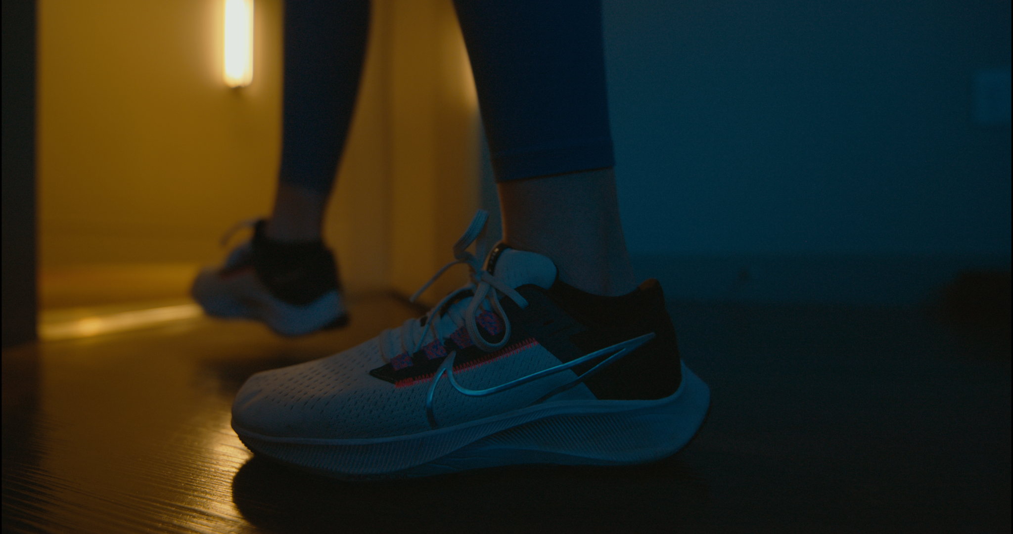 Woman stretching before running wearing Nike gear in Las Vegas commercial video production