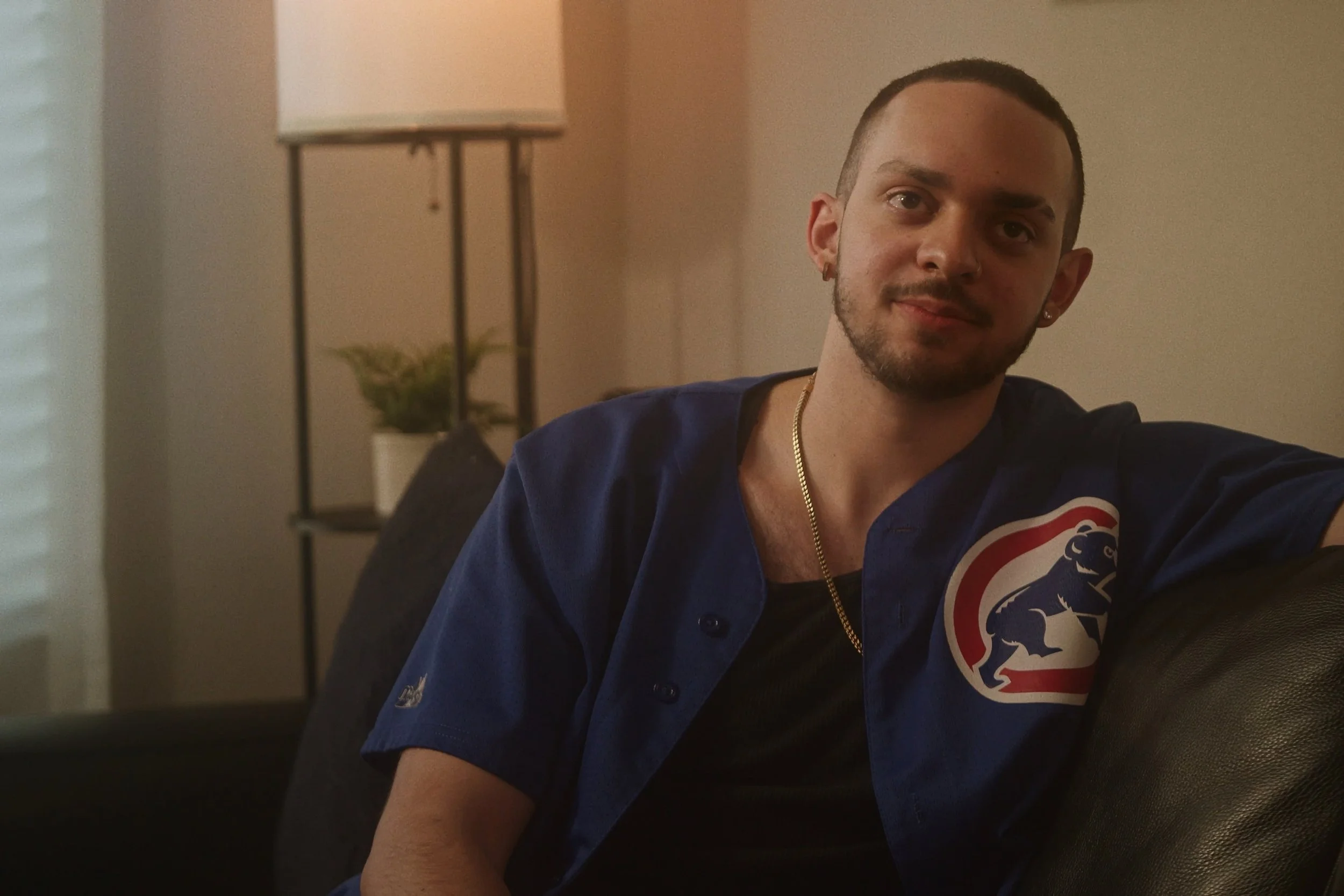 Friend listening from sofa during scene in Something Good