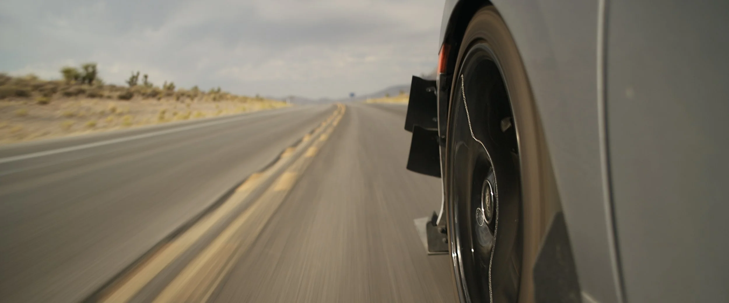 Close-up of Honda Civic wheel in motion