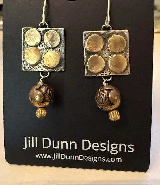 Textured Silver with Brass Details.