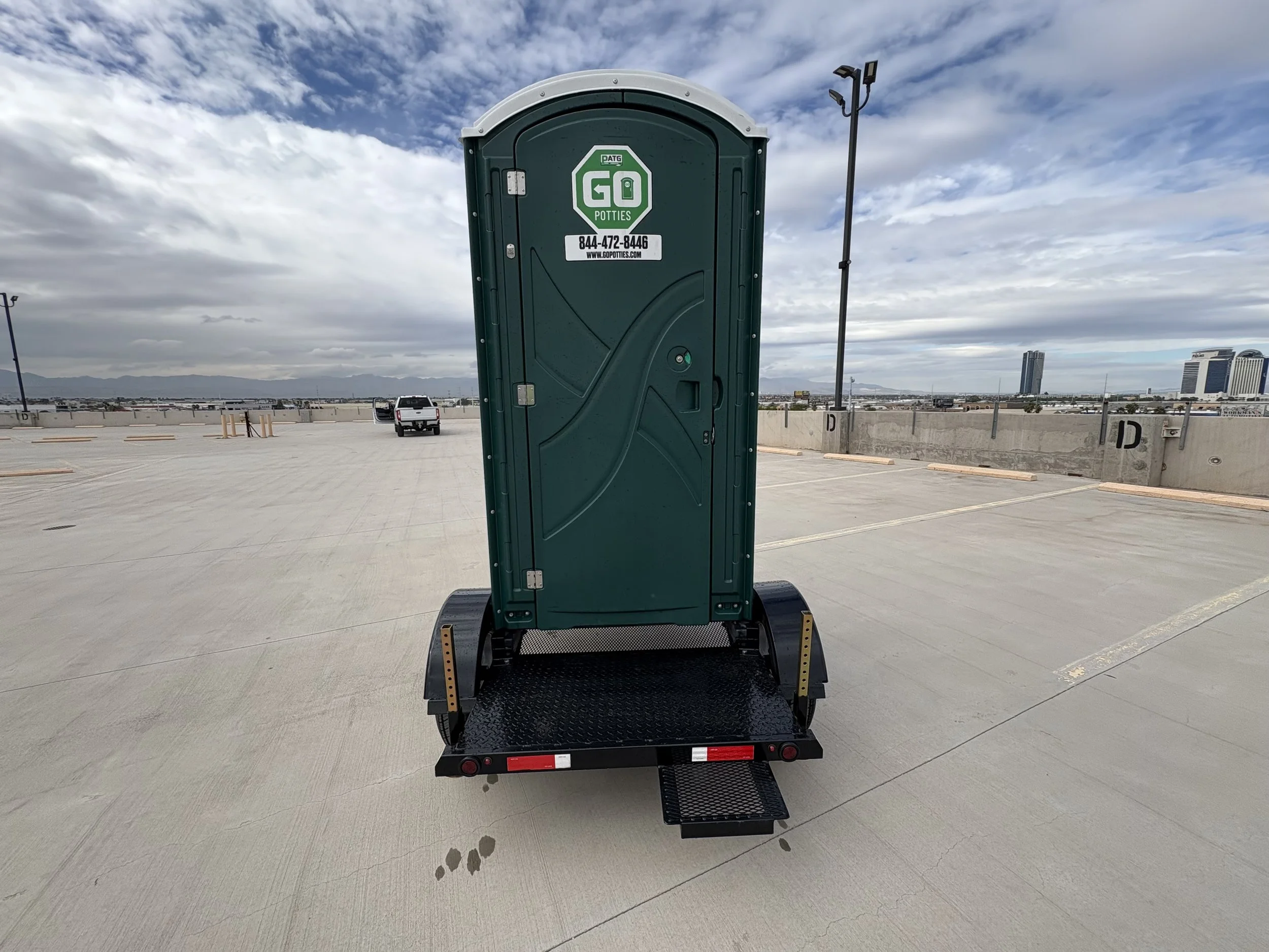 Front door of single towable restroom by Go Potties.jpeg