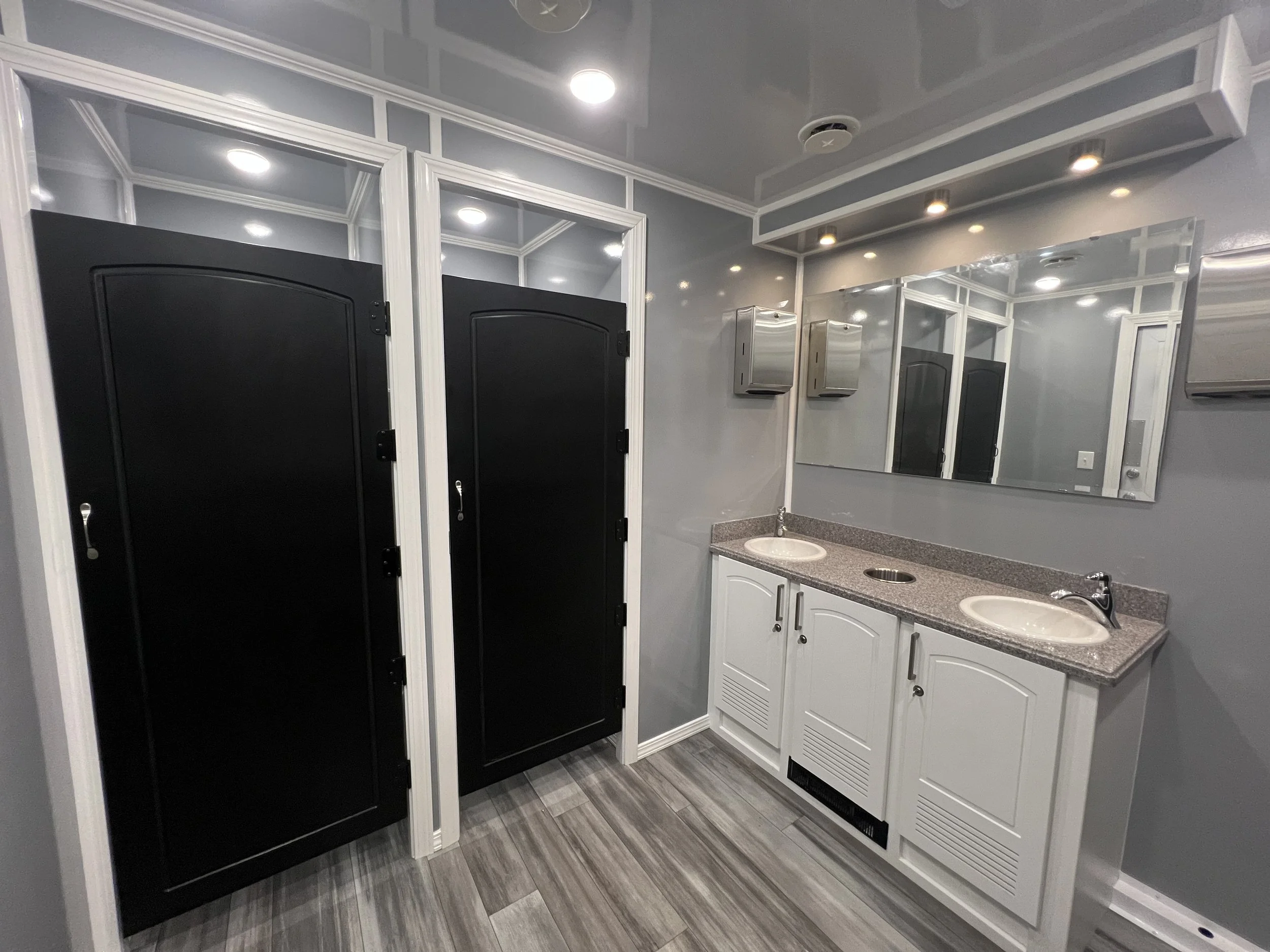 Go Potties 10-Stall Restroom Trailer interior.jpeg