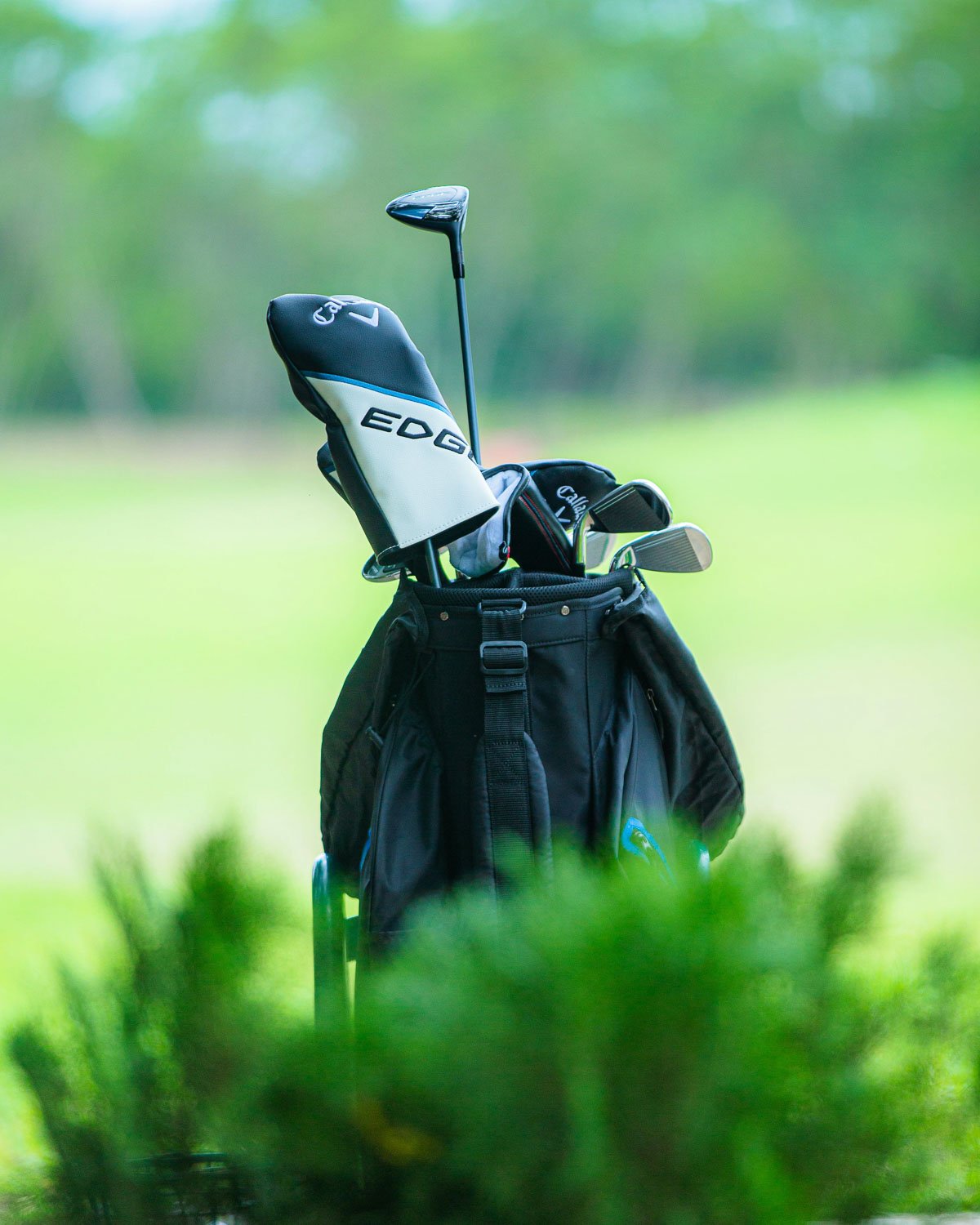 Golf bag and clubs on the course in a private golf community in Kansas City.