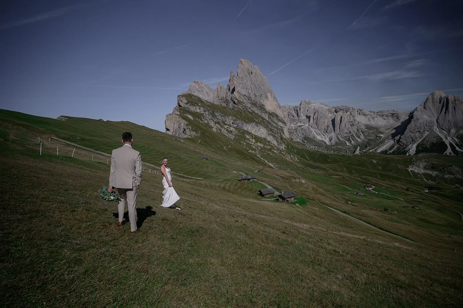 a bride and groom in the Italian Dolomites on their wedding day