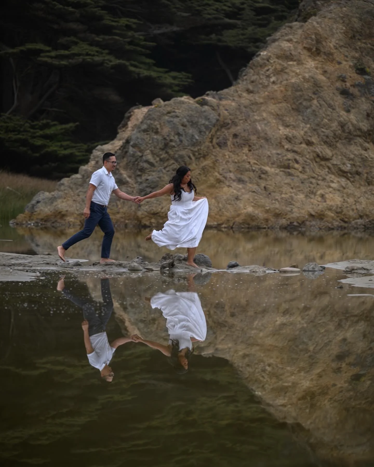 This beach in Big Sur wasn&rsquo;t just another stop on this full day engagement session, it was the place where it started. 

Months ago V had dropped to one knee here, pulling a ring from his pocket while the waves crashed behind them. Coming back 
