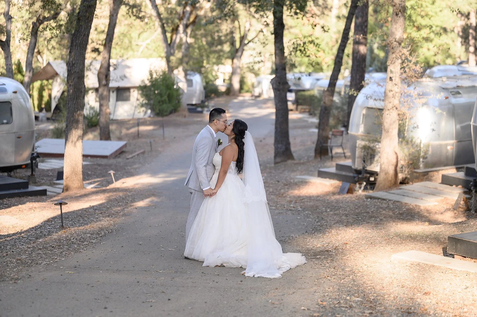a bride and groom on their wedding day at Yosemite Autocamp