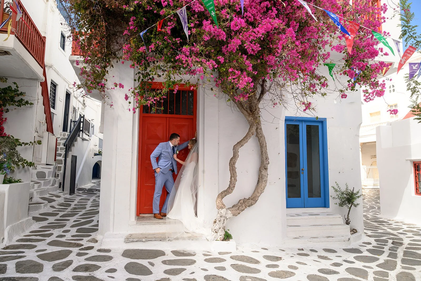 Elopement on the streets of Mykonos, Greece with a bride and groom