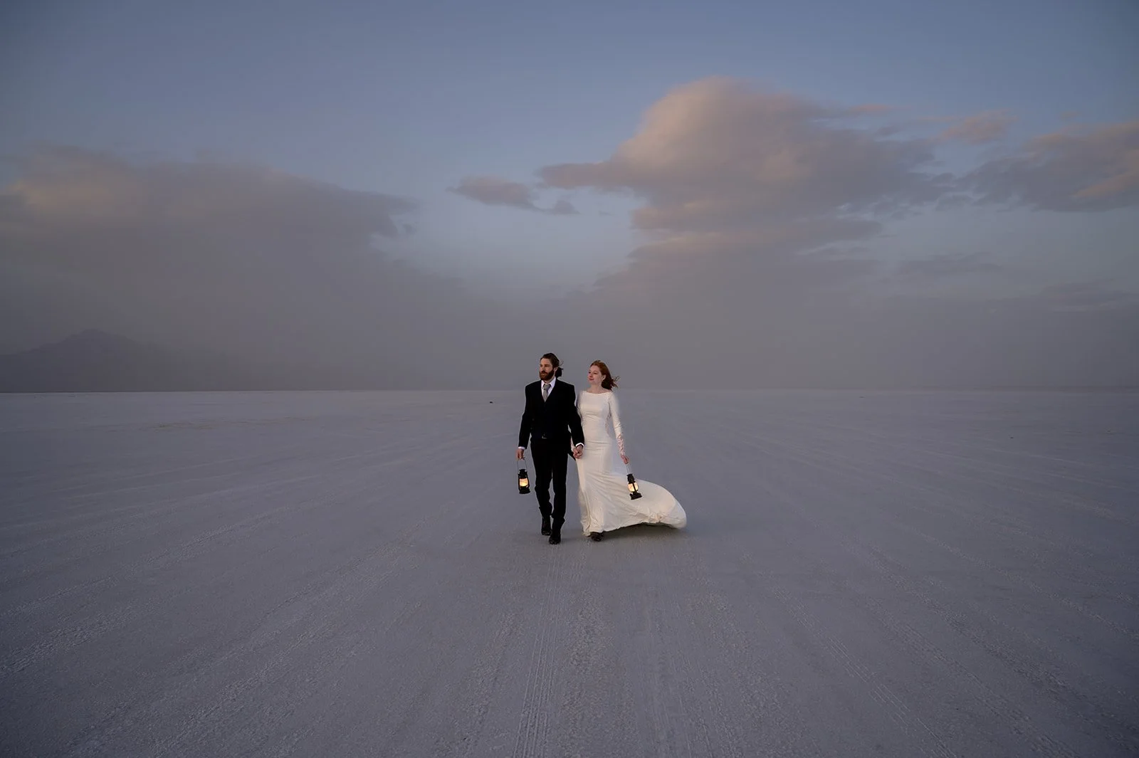 a bride and groom on the salt flats in Utah on their wedding day