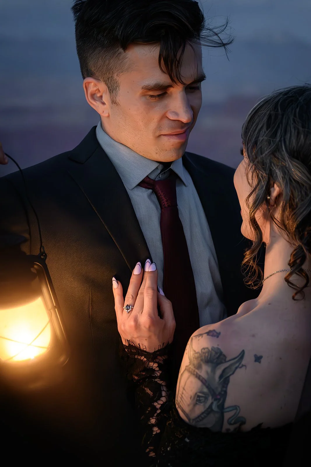 bride and groom in utah at night with lantens