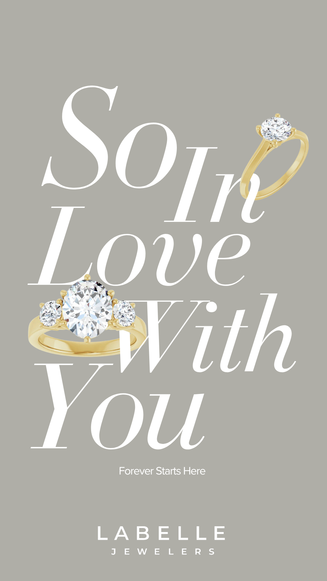 Advertisement for Labelle Jewelers with gold rings featuring large diamonds, overlaid with the text 'So In Love With You' and the tagline 'Forever Starts Here.'