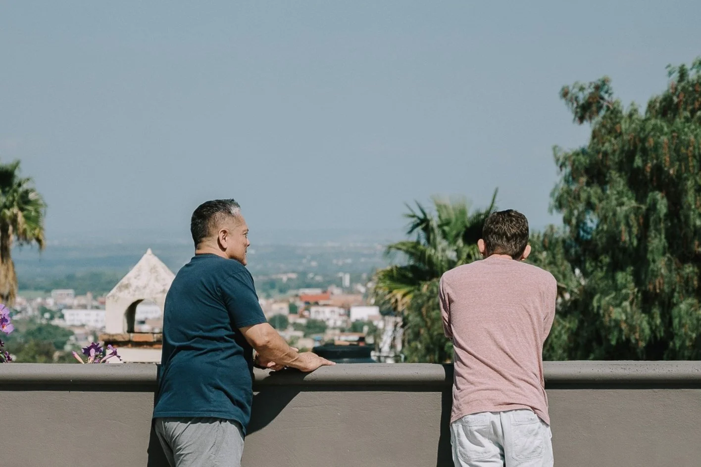 Two men at SHIFT Men's Retreat: A Somatic Retreat for Men conversing and deepening their friendship.