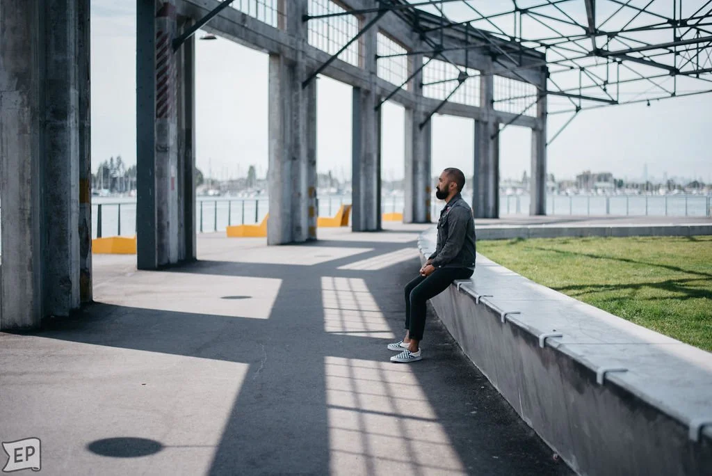 Mike Sagun a somatic experiencing practitioner sits in reflection about his survival responses, especially the freeze and shut down response.