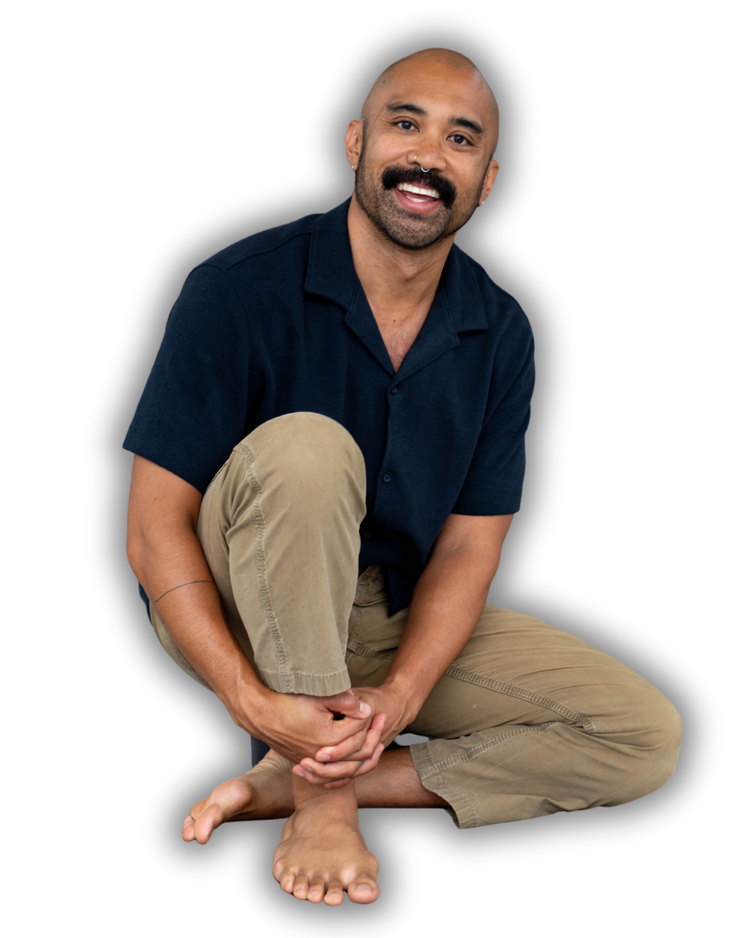 A headshot photo of Mike Sagun Somatic Experiencing Practitioner. He hosts men's retreats men's mental health programs.