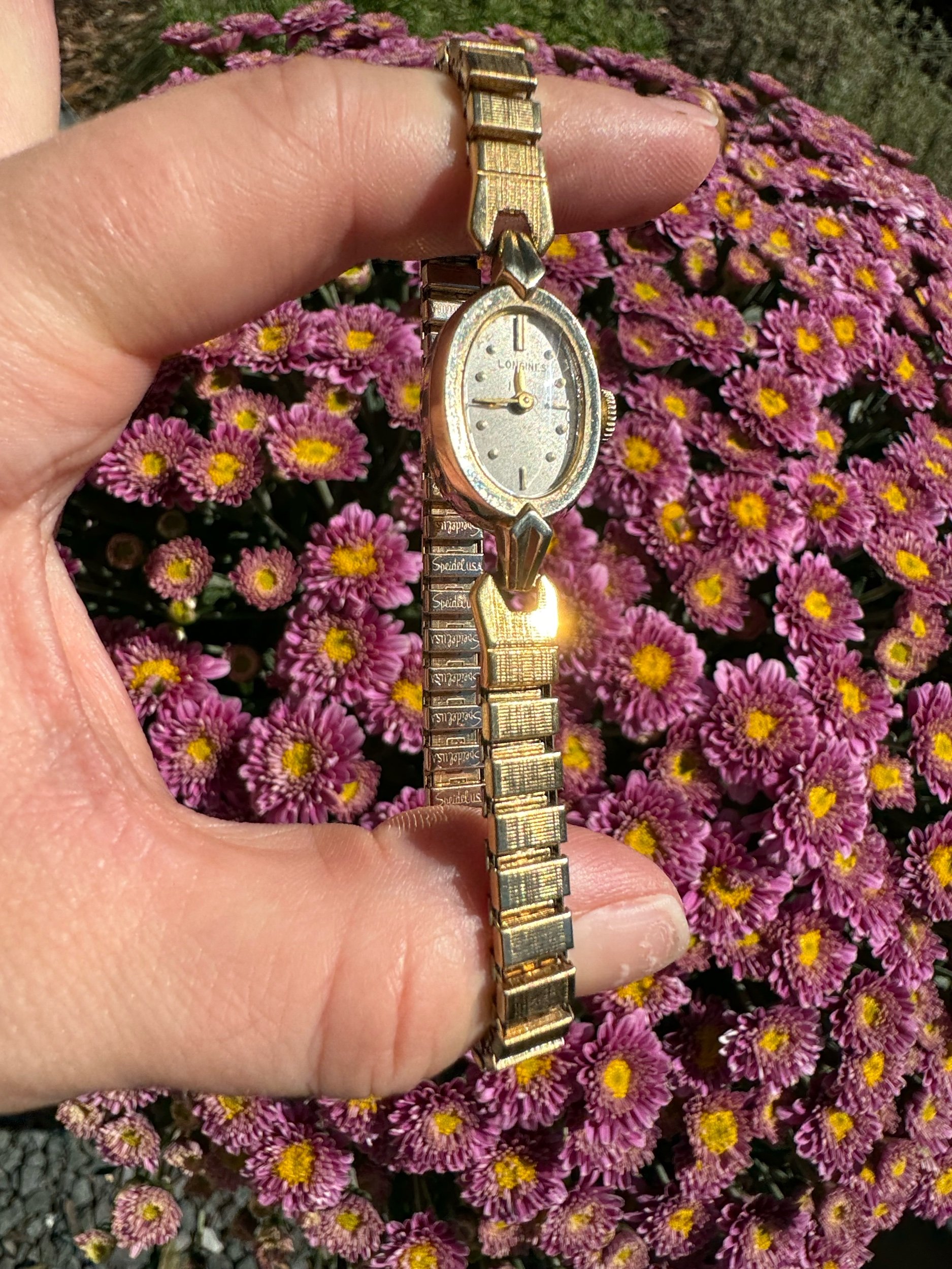 Vintage Longines gold watch with stretchy band