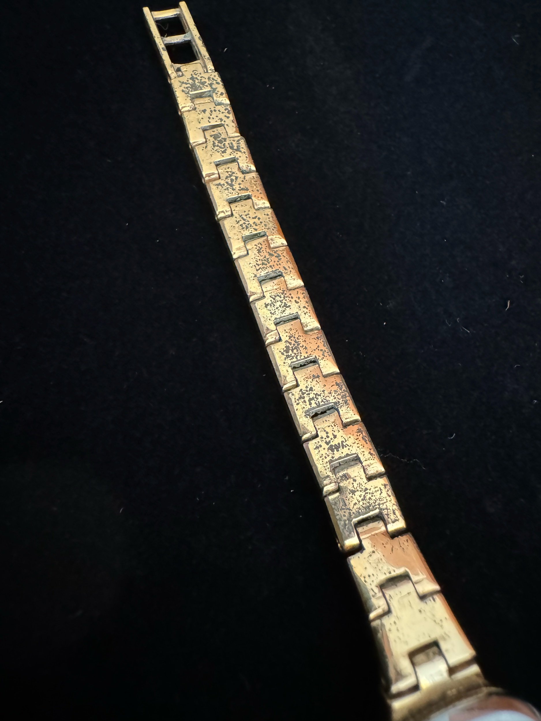 Back of vintage Helbros gold watch – reliable and durable mechanical timepiece