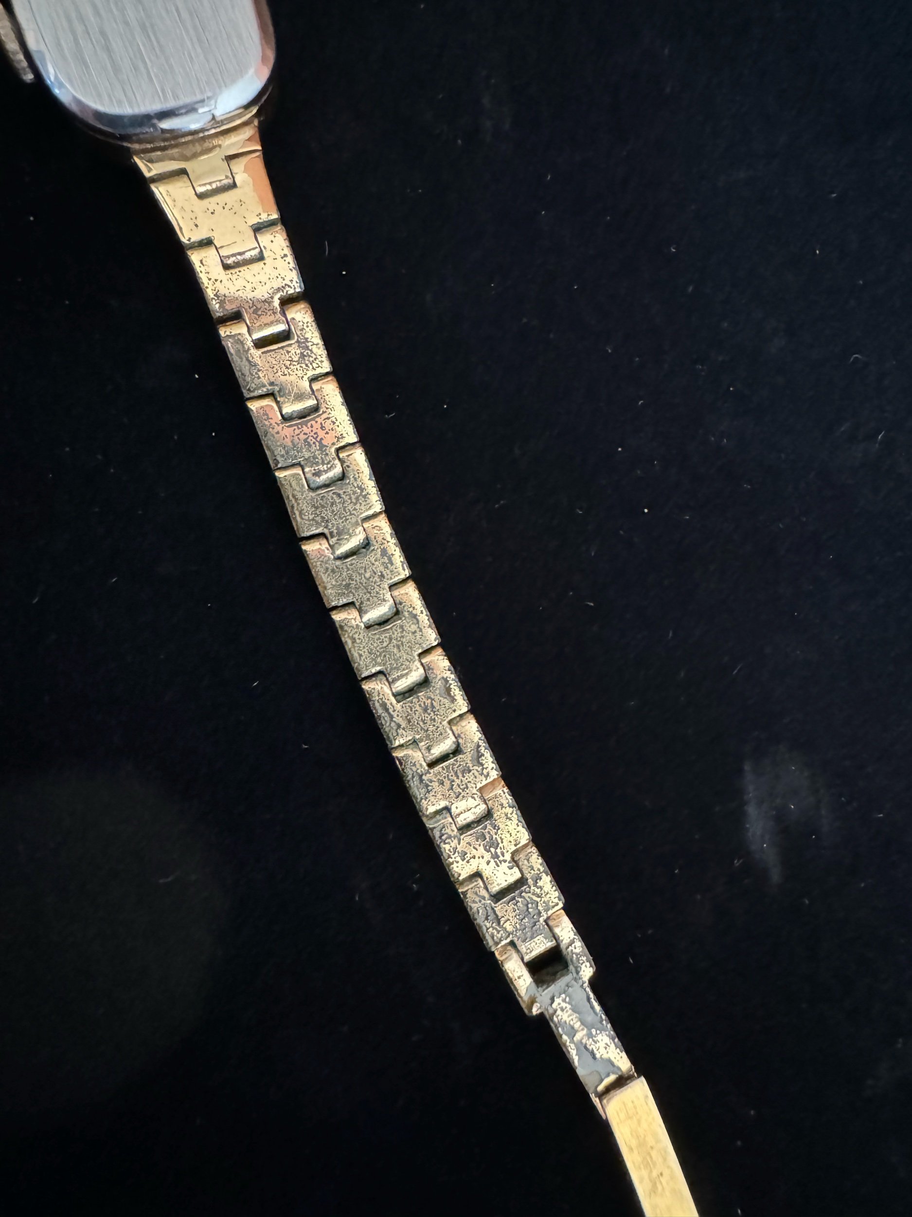 Back of vintage Helbros gold watch – reliable and durable mechanical timepiece