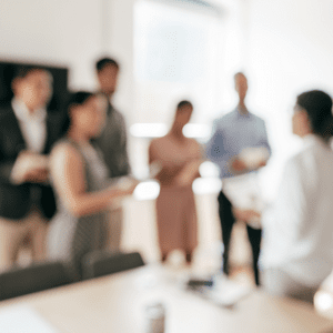 variety of adults standing taking notes from presenter