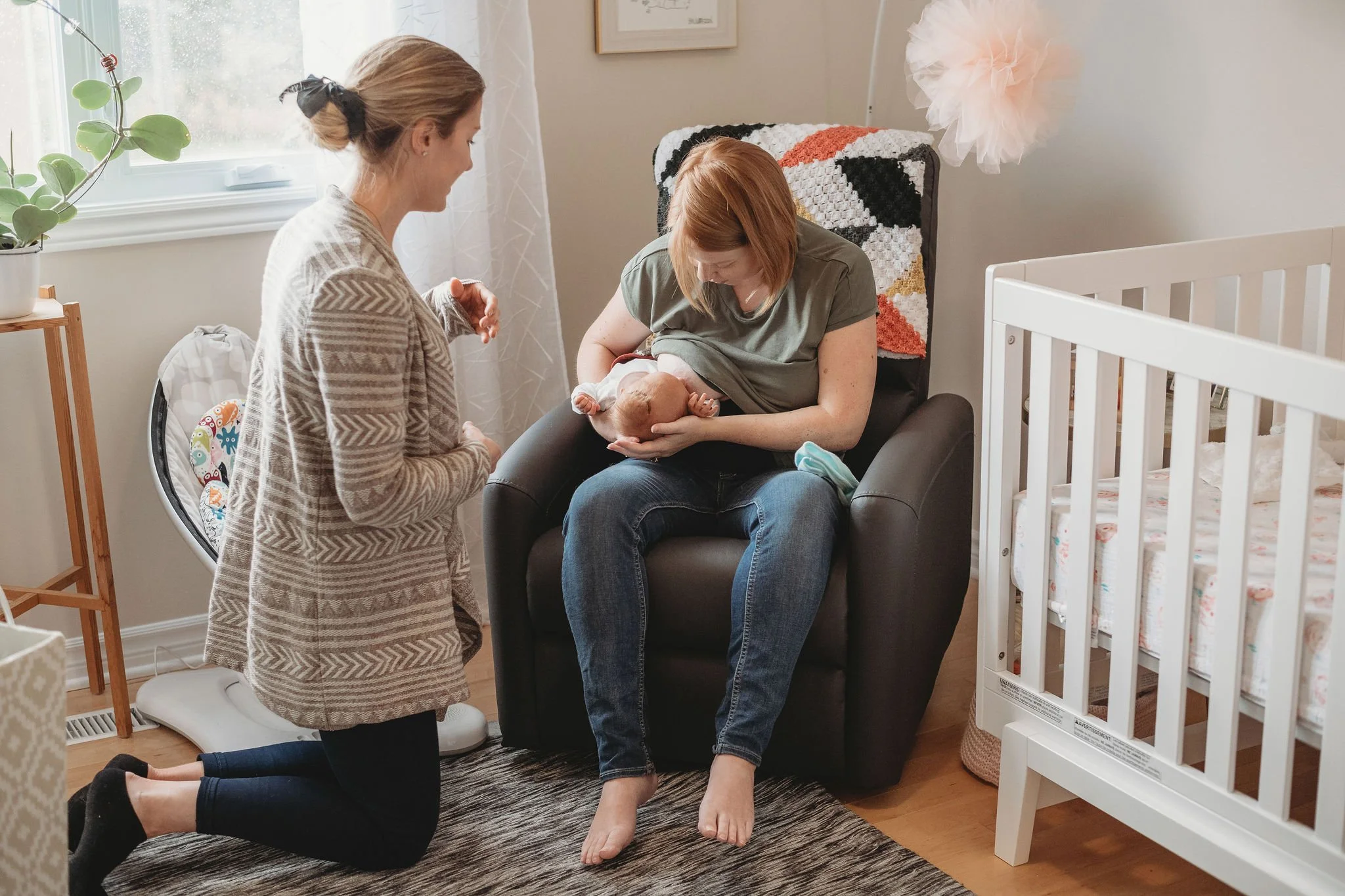 Birth doula demonstrating labor comfort measures during doula training session in Southern California