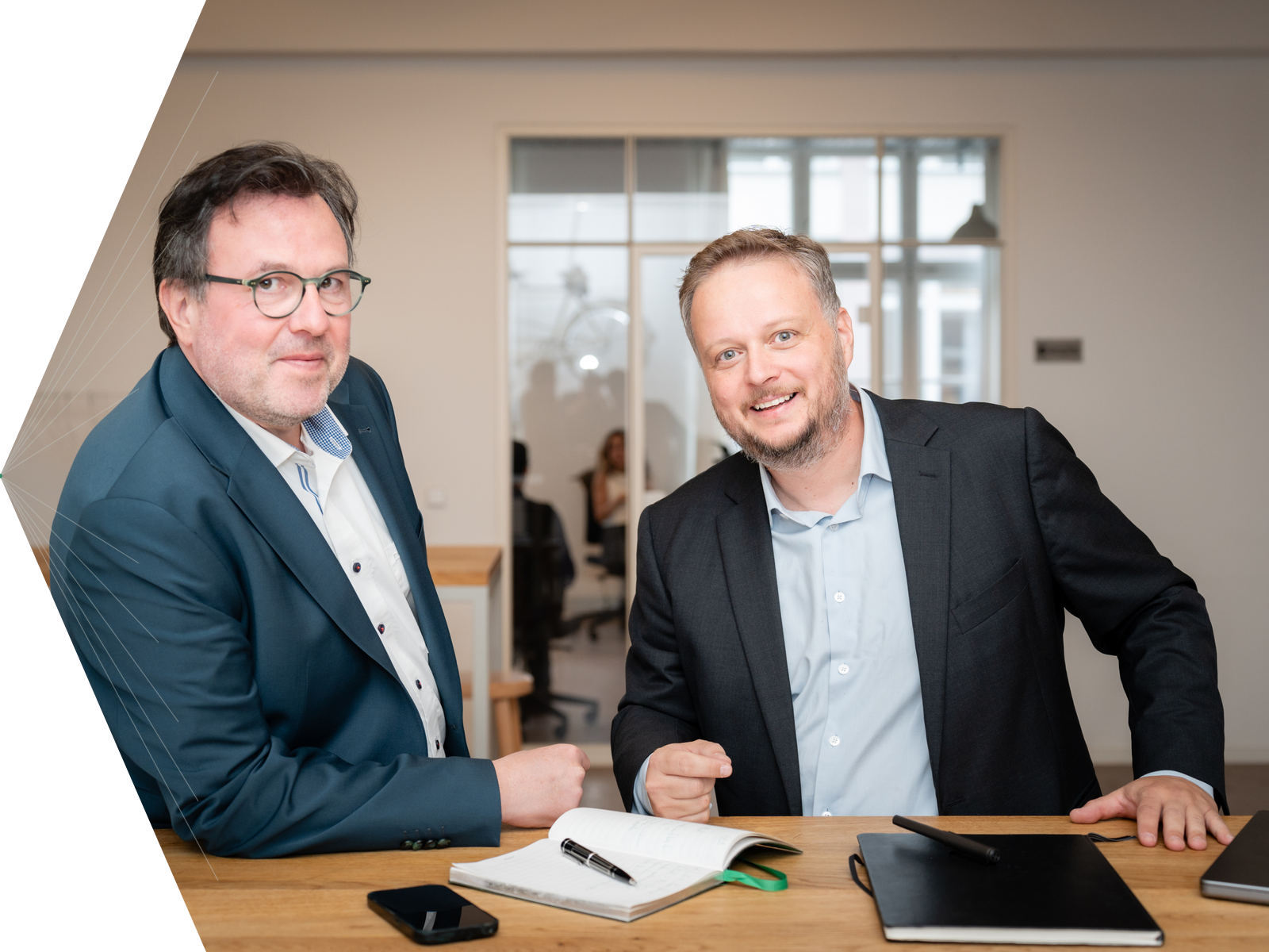 Foto der beiden Geschäftsführer von Schneider & Ortmanns