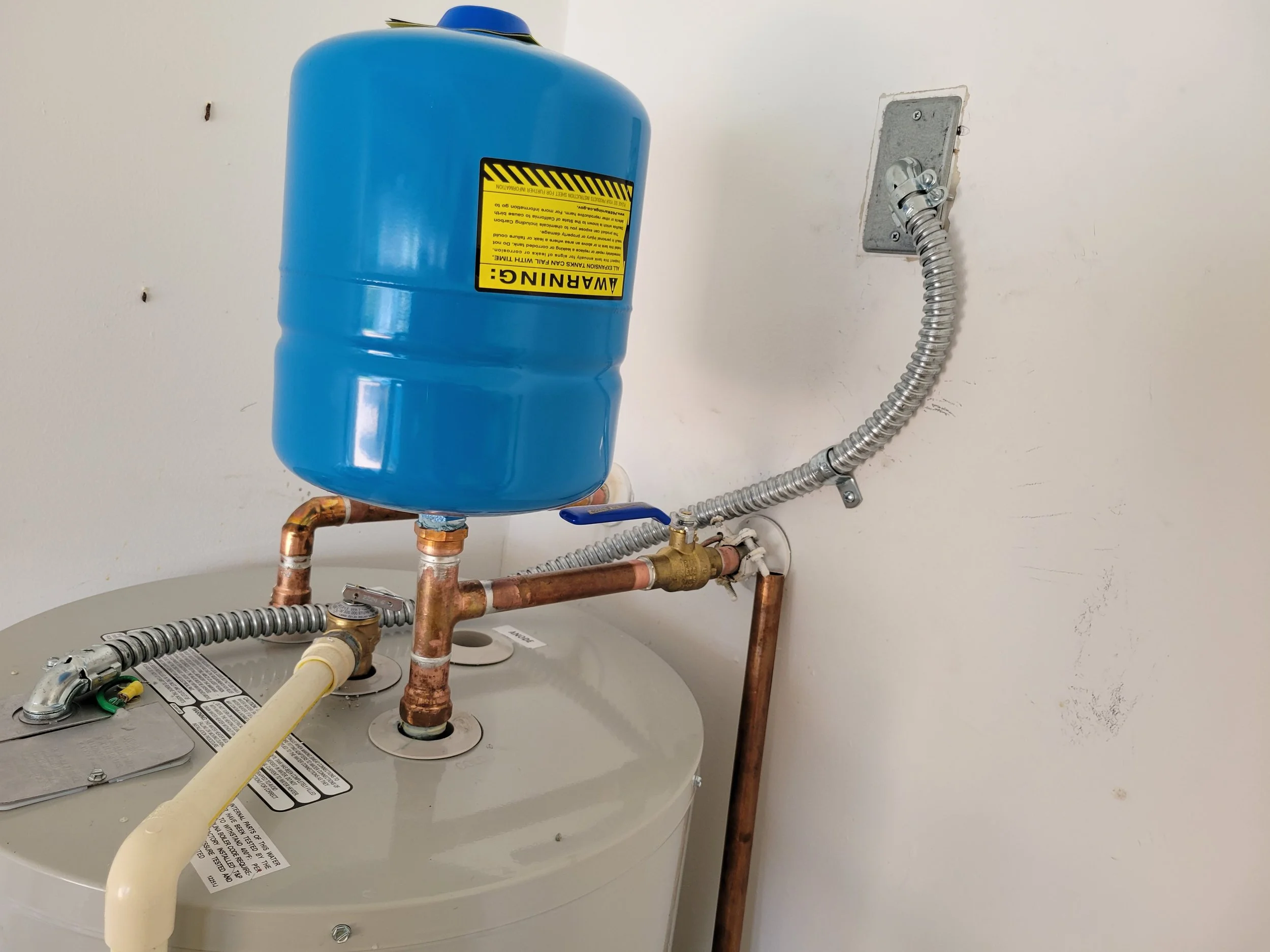 hard wire water heater in garage/residential property