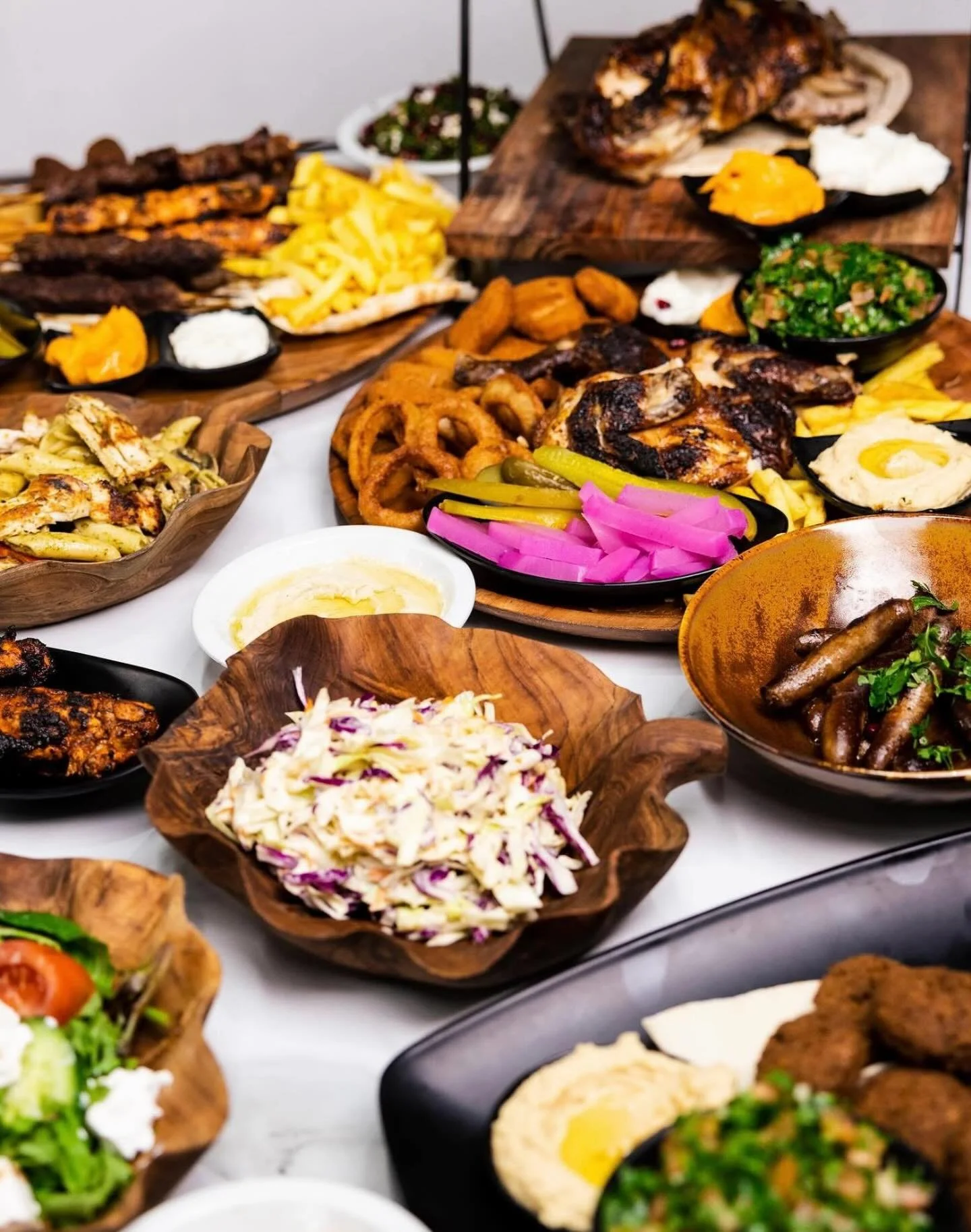🔥🍗 This is what a Lebanese feast looks like.
Charcoal chicken, juicy skewers, crispy sides, creamy dips, vibrant salads&hellip; all on one table 🤤✨

Gather your people, bring your appetite, and let Akly handle the rest 💛

📍 Riverwood
📞 9584 220