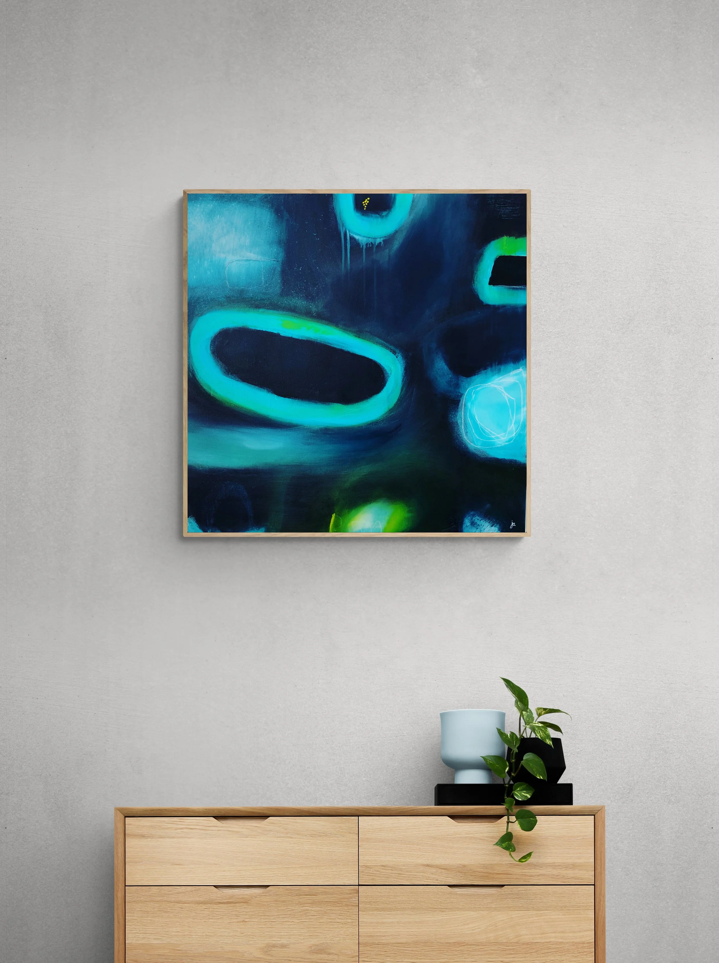 Modern_wood_cabinet_with_plant_and_vase (1).jpg