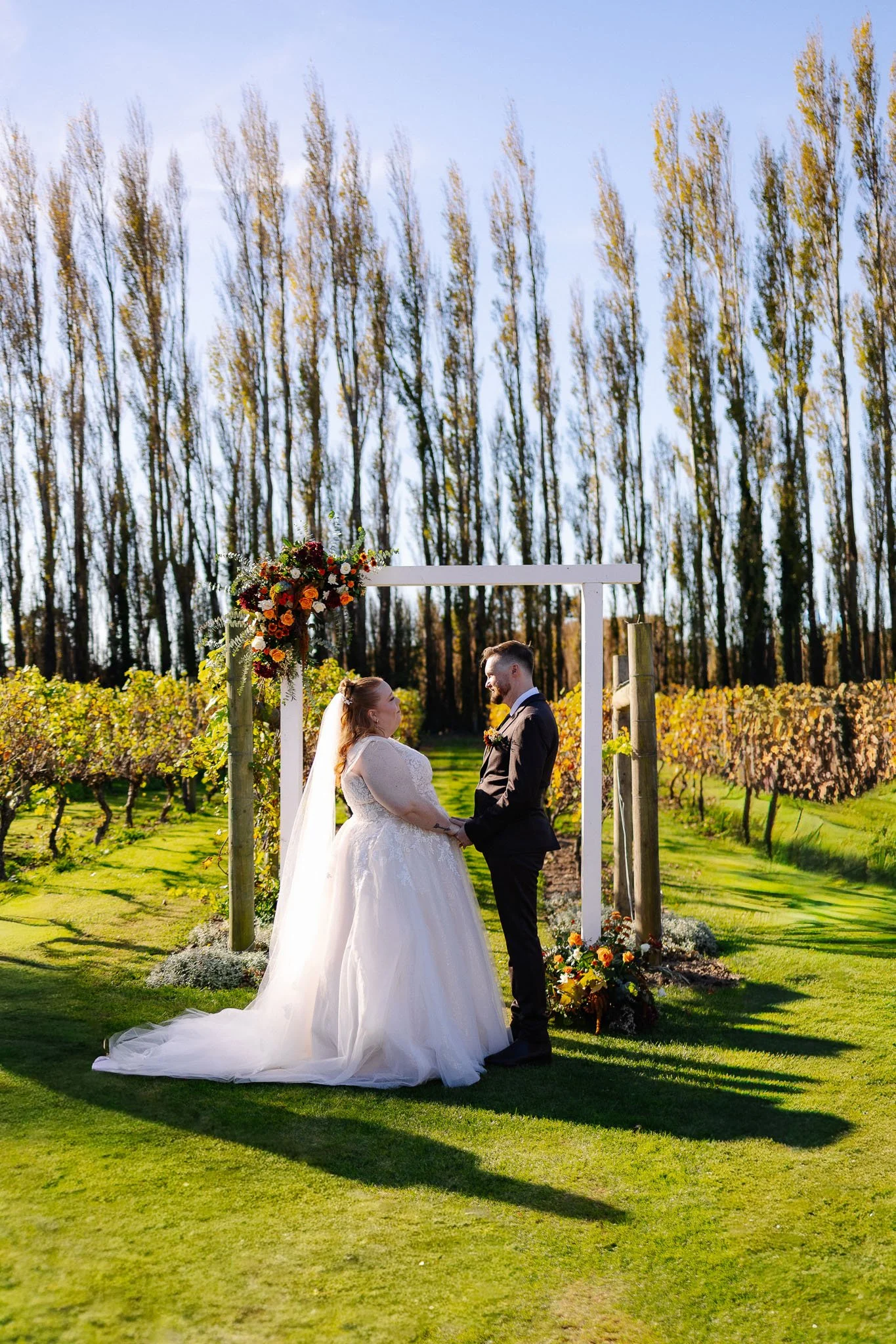 ceremony alysia shane wedding day photoshoot  christchurch canterbury new zealand cossar wineshed photoshoot wedding photography videography photographer videographer Kate Kish-95.jpg