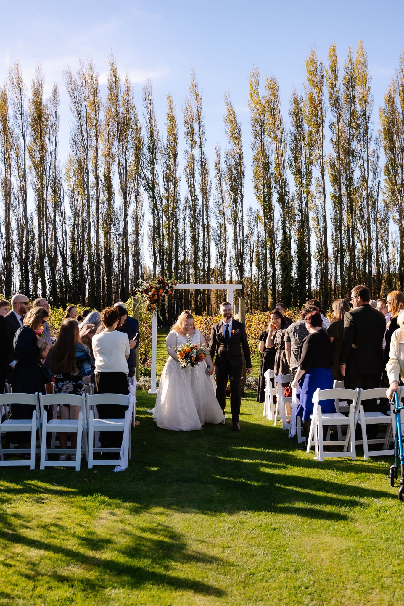 ceremony alysia shane wedding day photoshoot  christchurch canterbury new zealand cossar wineshed photoshoot wedding photography videography photographer videographer Kate Kish-101.jpg