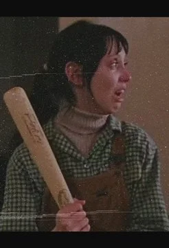 Wendy Torrance holding a baseball bat