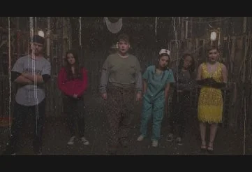 The group of friends enter the haunted attraction in Haunt