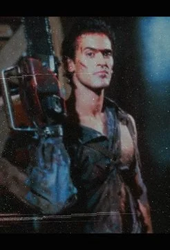 Ash Williams with his Chainsaw hand in Evil Dead II