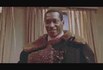 Candyman smiling menacingly