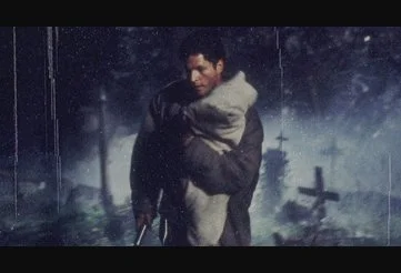Dr. Louis Creed heartbreakingly about to bury his deceased son in the Pet Sematary