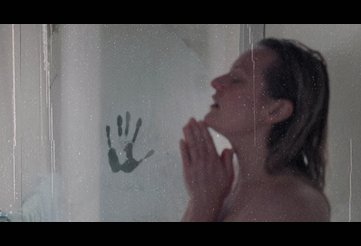 Cecilia taking a shower in the presence of The Invisible Man